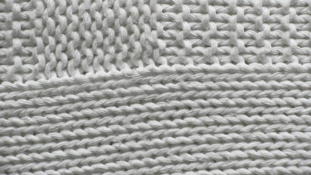 Close-up of white knitted fabric