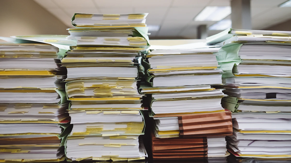 Stacks of paper documents and file folders in an office